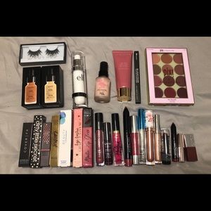Assortment of lip sticks, face primers, etc.